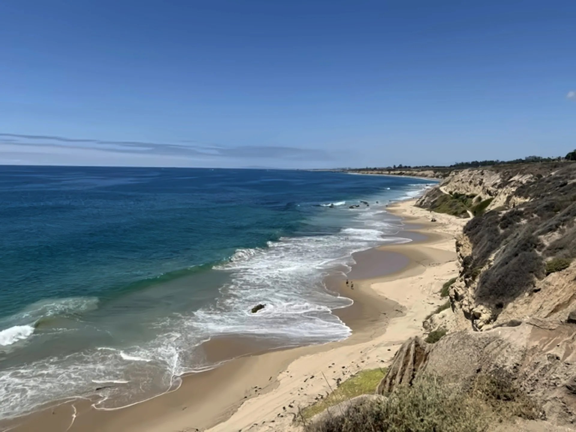 A calm stretch of coastline with gentle surf, the safer waters the practice is named for